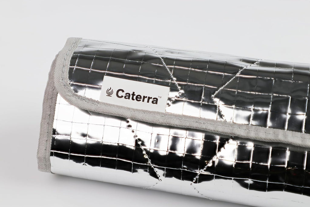 Quilted heat-reflective Caterra storage bag holding the rolled-up warming mat
